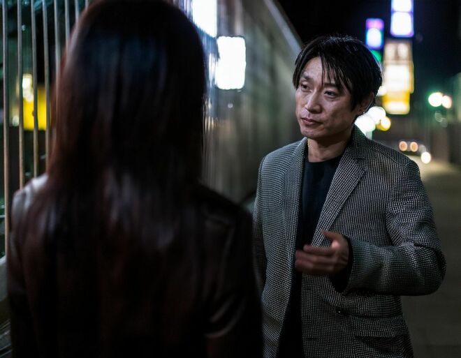 不気味な男